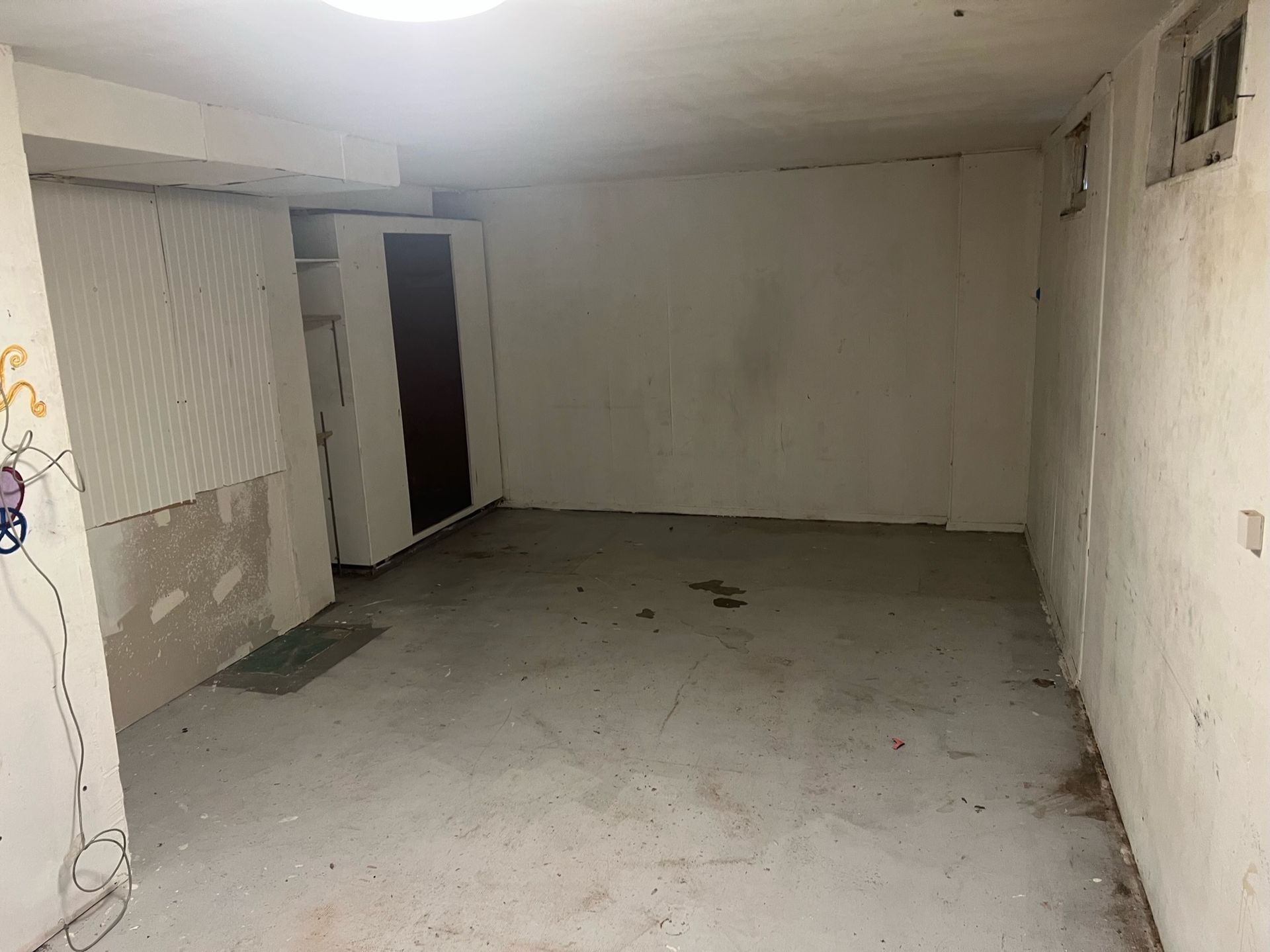 Cleared paneled room after a Trash Bandits cleanout