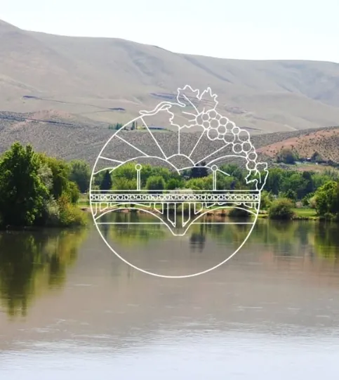Prosser, WA city logo over the Yakima River